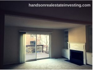 Living Room w/ Fireplace how to invest in real estate beginner real estate investor