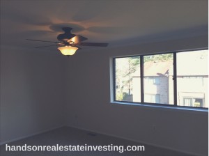 Master Bedroom w/ Ceiling Fan beginner real estate investor how to invest in real estate