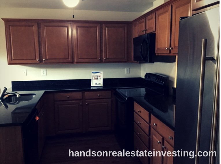 Eat-In Kitchen w/ Granite Countertops beginner real estate investor how to invest in real estate